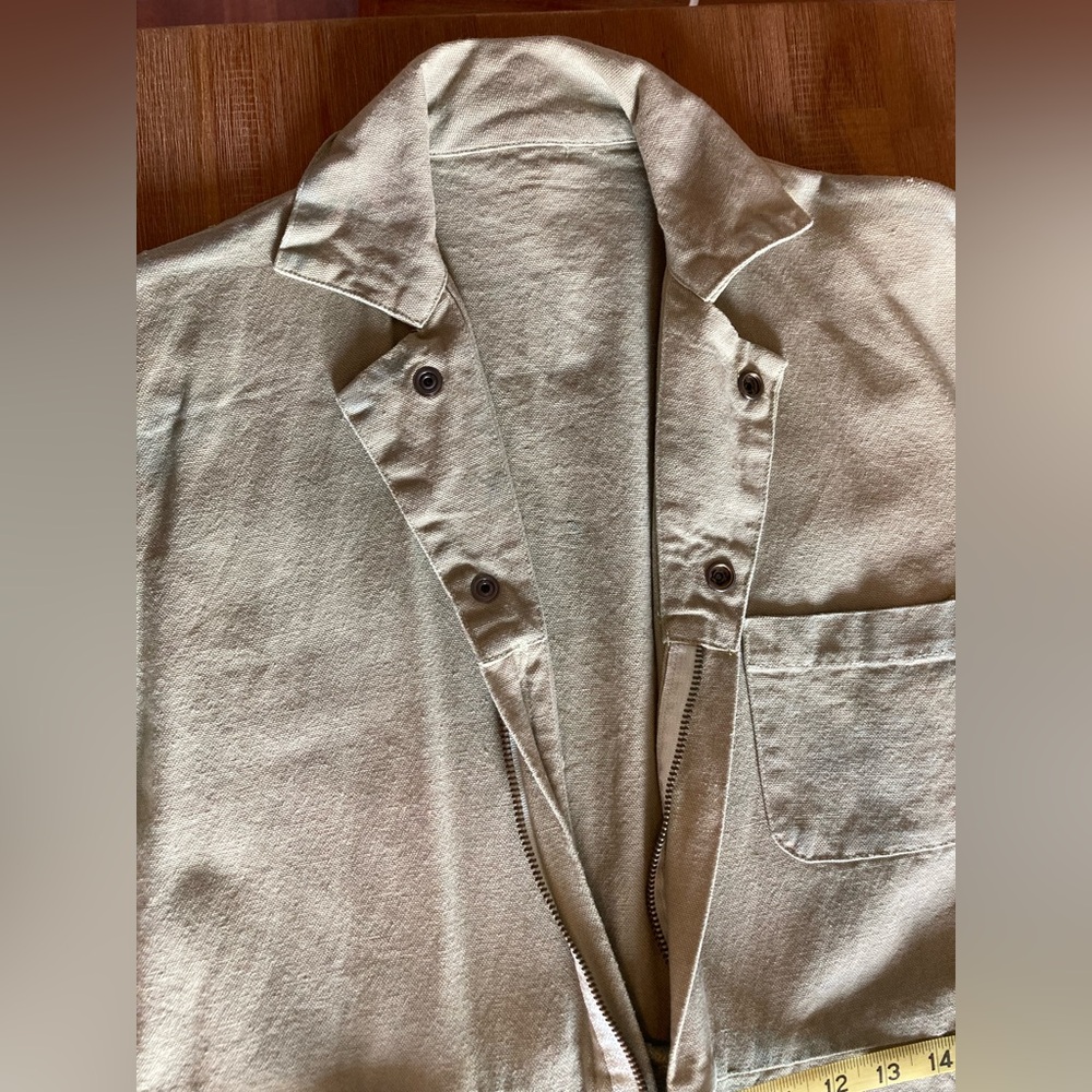 Pale green canvas utility jumpsuit workwear coveralls
